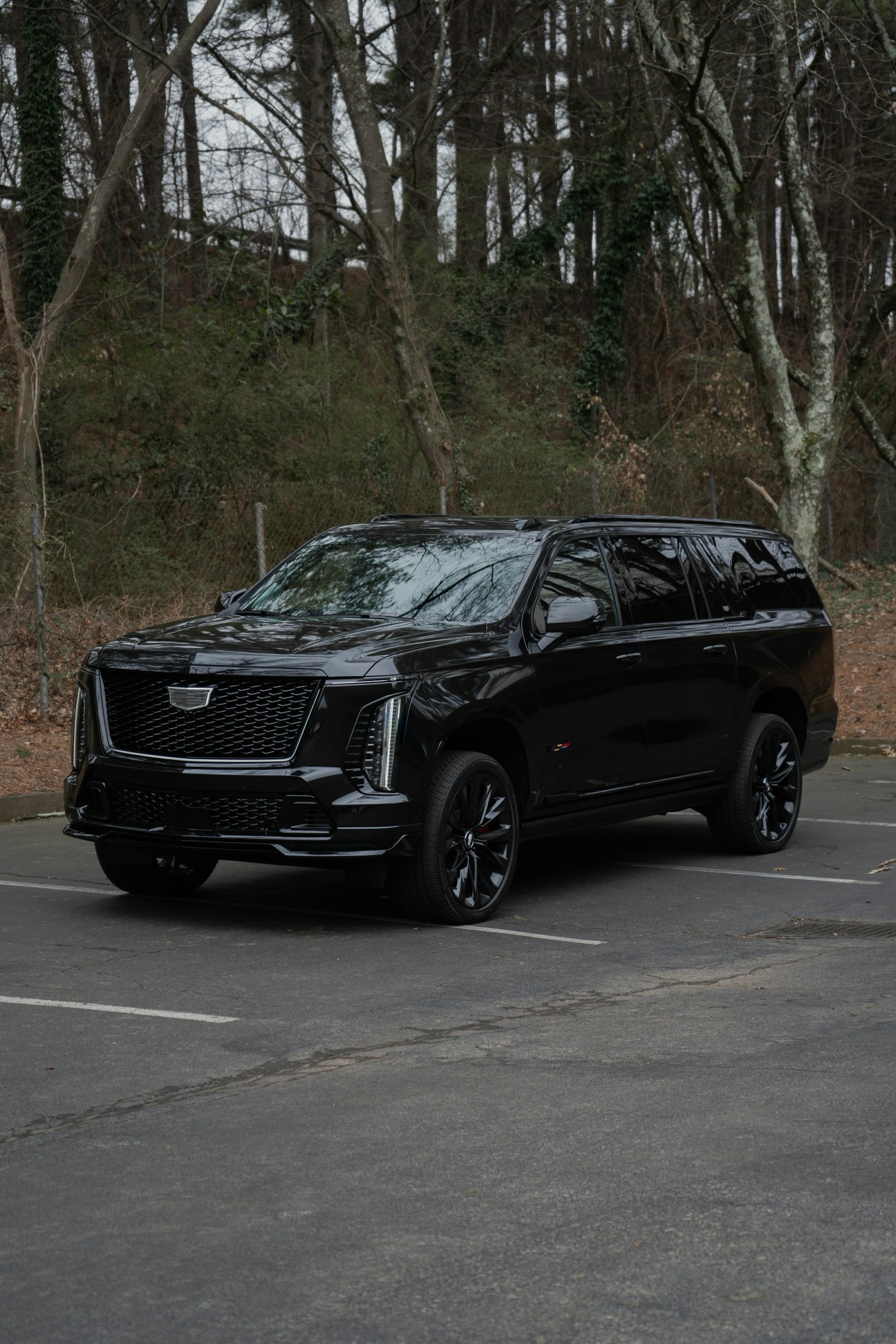 Black Cadillac Escalade luxury SUV