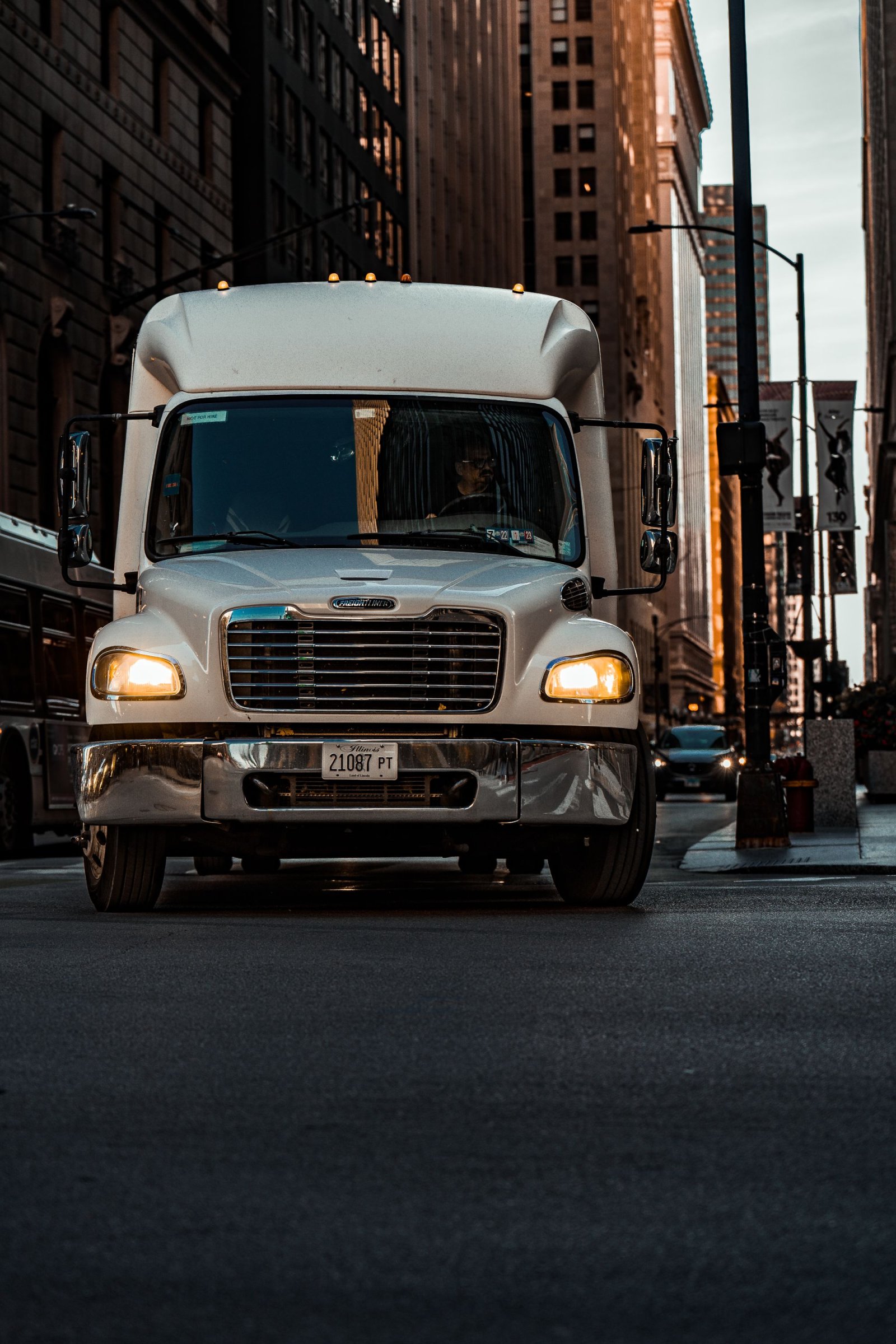 Executive mini coach shuttle bus on a downtown street