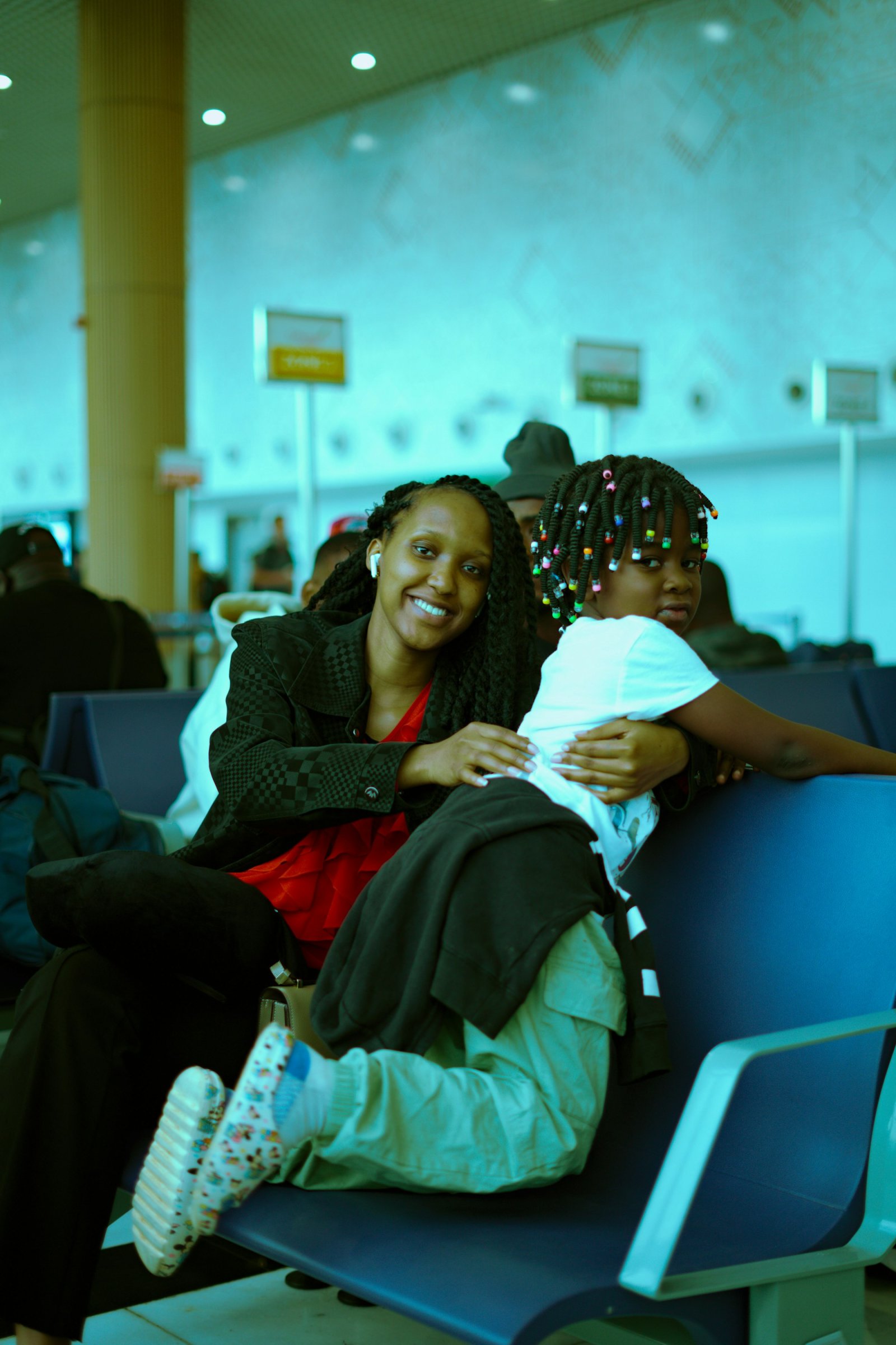 Mother and child waiting at an airport