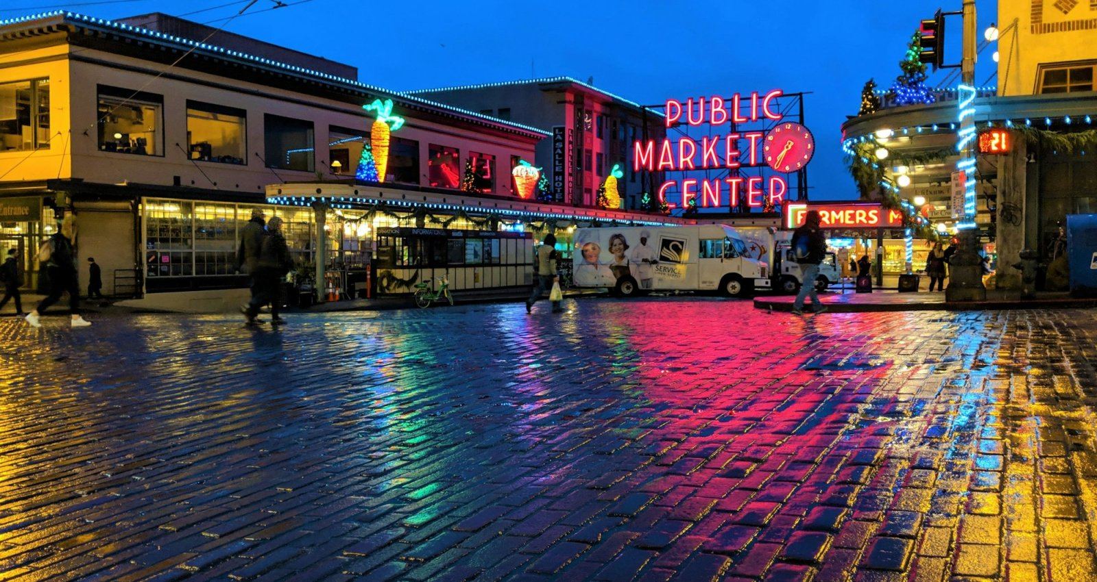 Pike Place Market neon sign at night