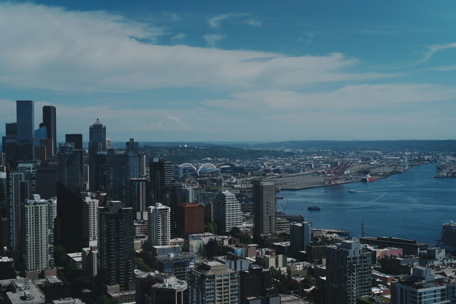 Aerial view of downtown Seattle, Elliott Bay and the Olympic Mountains