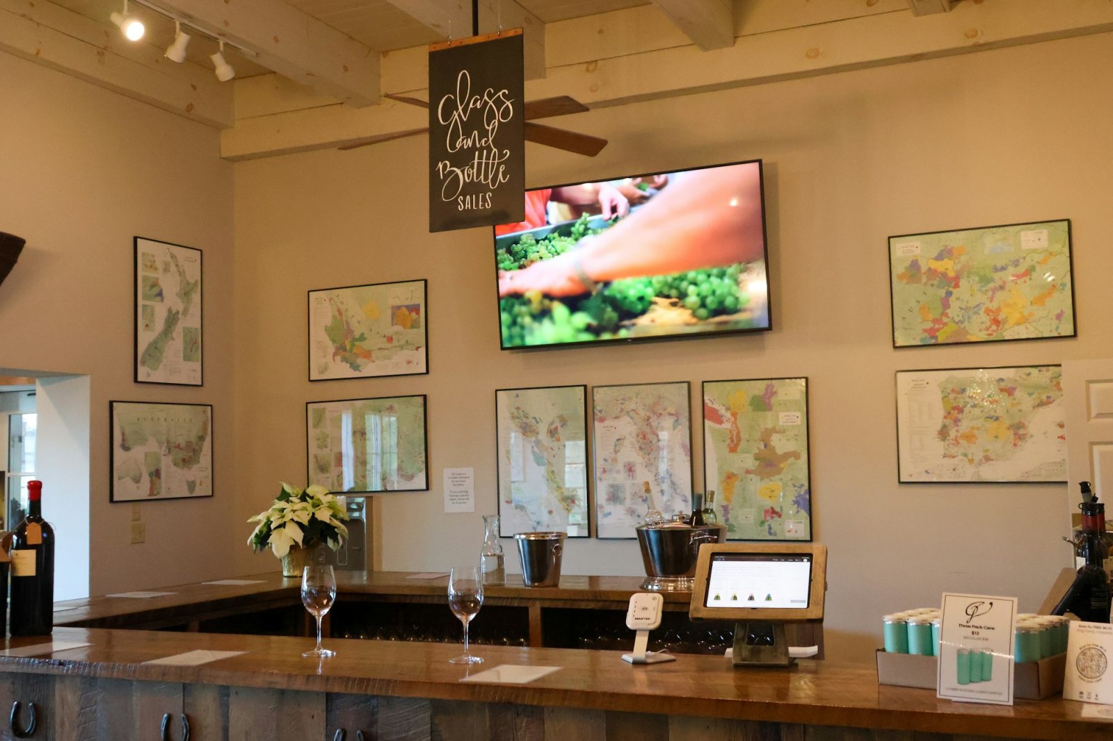 Tasting room bar with wine glasses and bottles